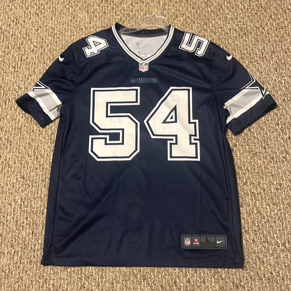 This is a Jaylon smith cowboys jersey and a Old dotted Zeke Jersey